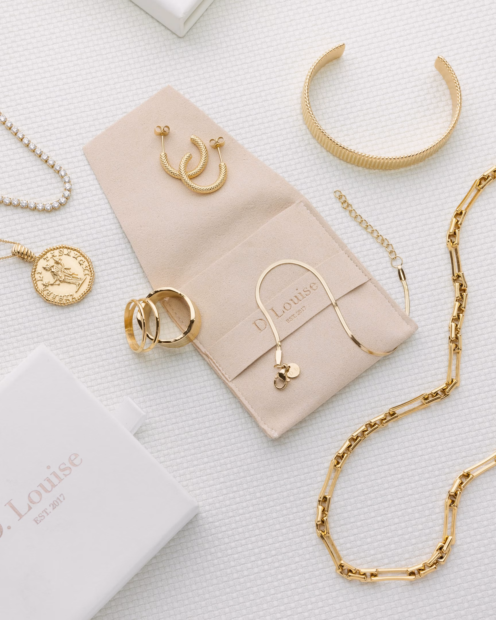 D. Louise jewellery with pouch